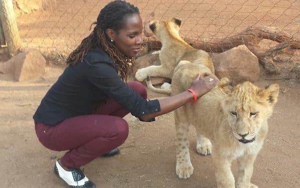 Luvvie petting lion cub
