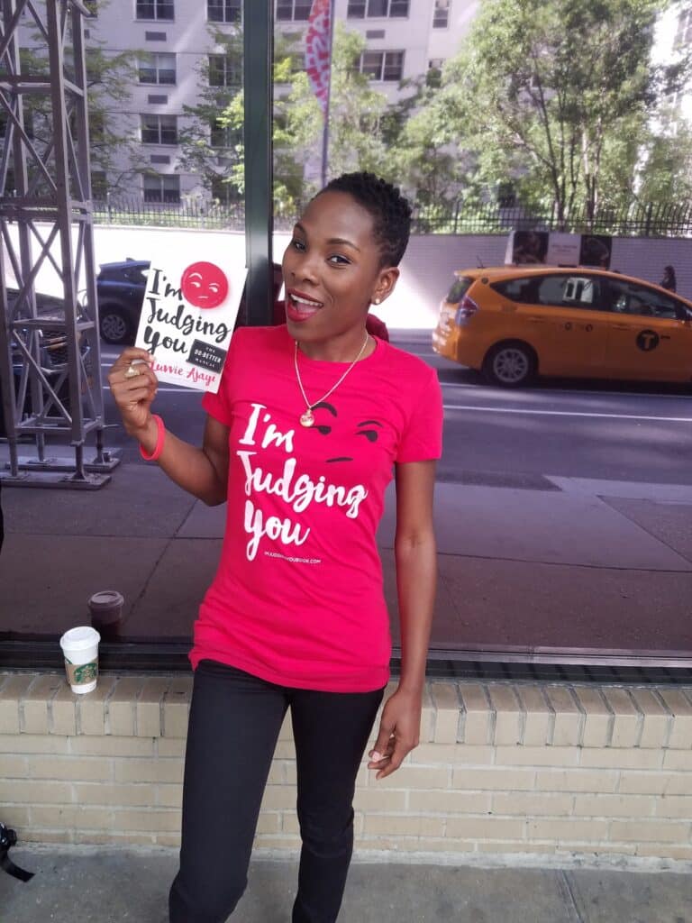 Luvvie-posing-with-first-book
